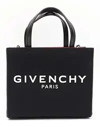 Black Givenchy Paris mini canvas tote bag with white logo lettering, dual top handles, and gold-tone hardware against a white background